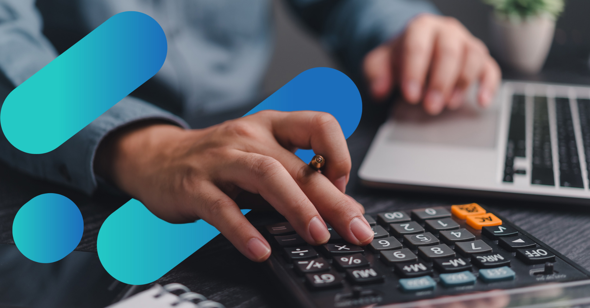 IT-Budget-Planning A man's hand typing on a calculator